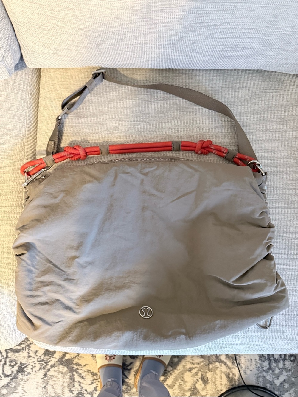 lululemon athletica Gray Messenger Bag with Red Handle Accents